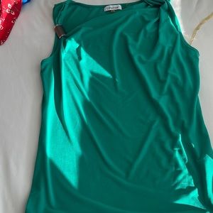 Green fitted dressy tank with gold shoulder detail